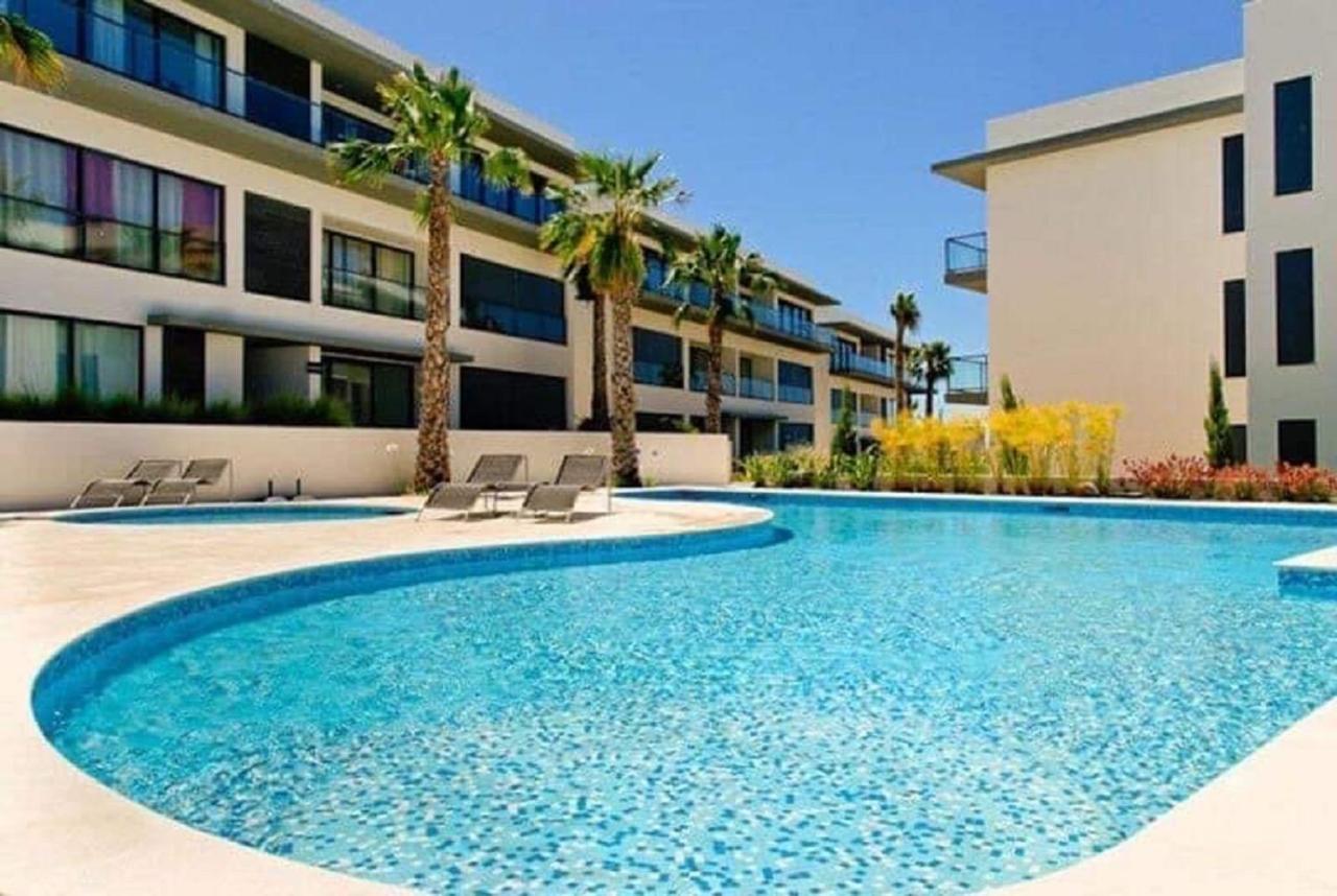 Apartamentos Cavalo Preto Beach Resort Картейра Экстерьер фото