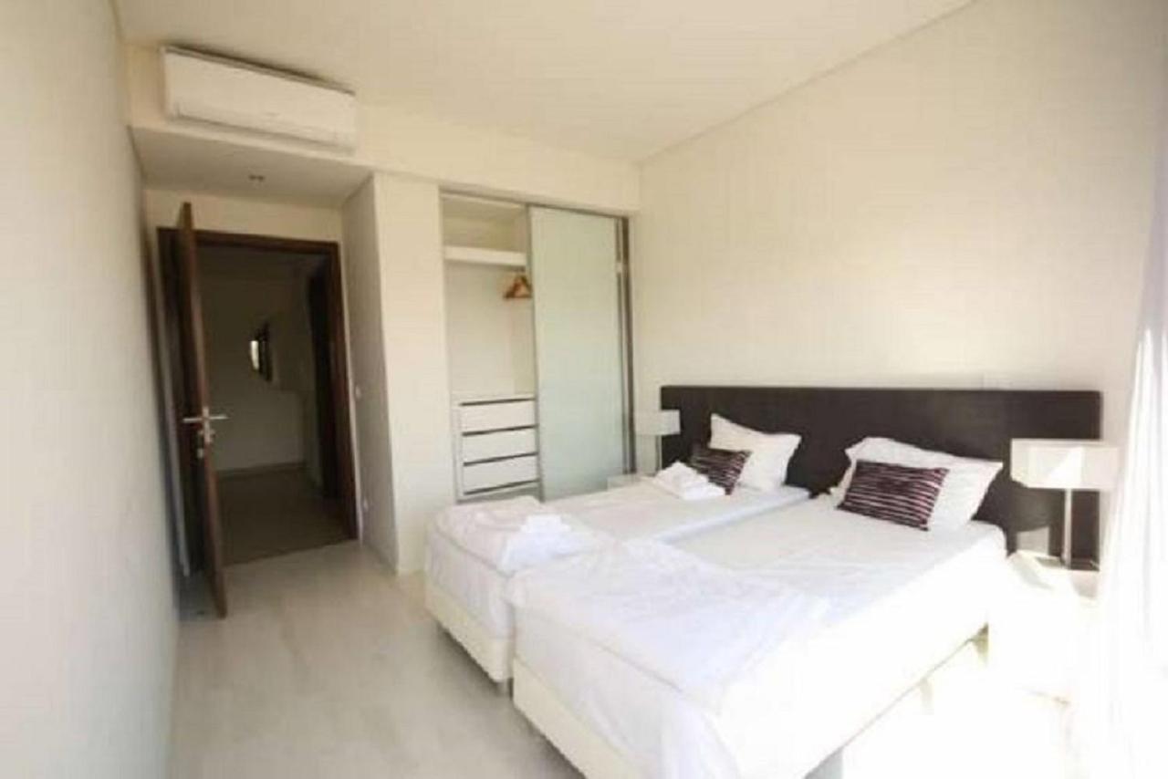 Apartamentos Cavalo Preto Beach Resort Картейра Экстерьер фото